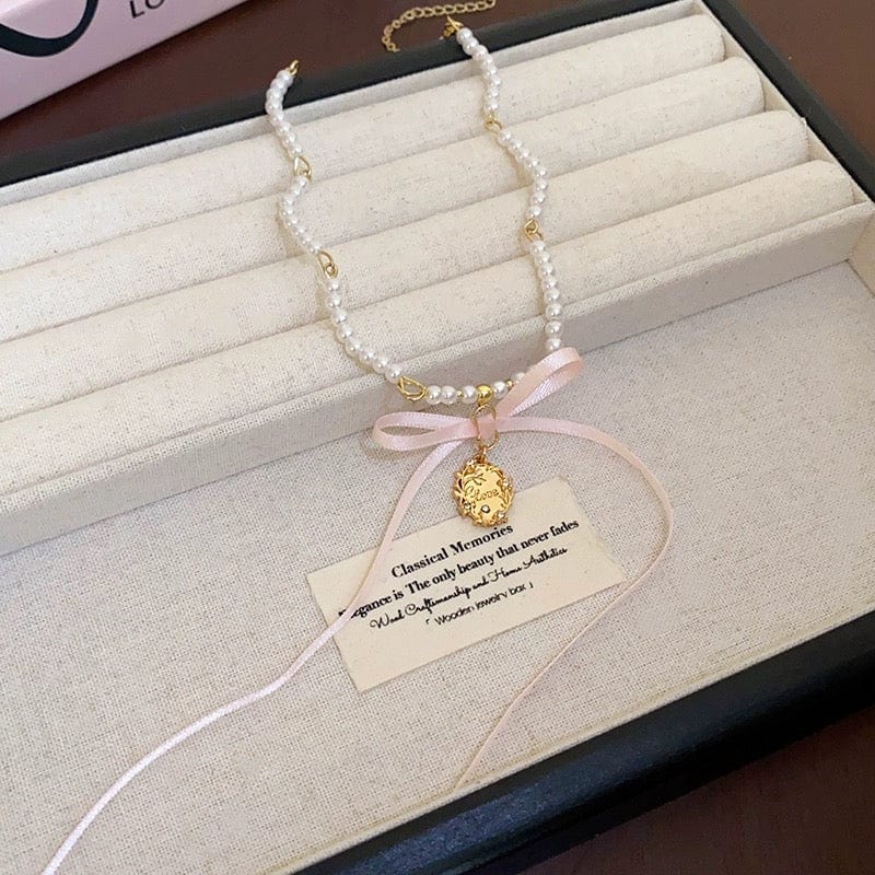 Baroque Pink Ribbon Bowknot Relief Pendant Pearl Necklace - ArtGalleryZen