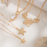 Thumbnail for Bohemia 4pcs Irregular Pearl Flower Starfish Pendant Necklace Set - ArtGalleryZen