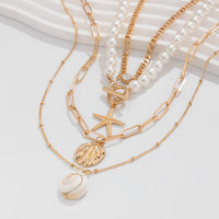 Thumbnail for Boho 4Pcs Crystal Inlaid Starfish Conch Pendant Pearl Chain Necklace Set - ArtGalleryZen