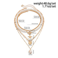 Thumbnail for Boho 4Pcs Crystal Inlaid Starfish Conch Pendant Pearl Chain Necklace Set - ArtGalleryZen
