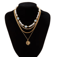 Thumbnail for Boho Layered CZ Inlaid Sun Moon Pendant Evil Eye Pearl Chain Necklace Set - ArtGalleryZen