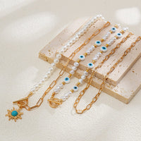 Thumbnail for Boho Layered Toggle Clasp Turquoise Sun Pendant Evil Eye Pearl Chain Necklace Set - ArtGalleryZen
