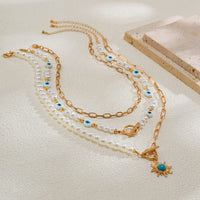 Thumbnail for Boho Layered Toggle Clasp Turquoise Sun Pendant Evil Eye Pearl Chain Necklace Set - ArtGalleryZen