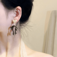 Thumbnail for Charming Enamel Heart Dangling Ribbon Bowknot Earrings - ArtGalleryZen