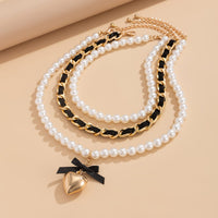 Thumbnail for Chic 3pcs Ribbon Heart Pendant Pearl Chain Velvet Necklace Set - ArtGalleryZen