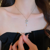 Thumbnail for Chic CZ Inlaid Bowknot Heart Magic Wand Necklace - ArtGalleryZen