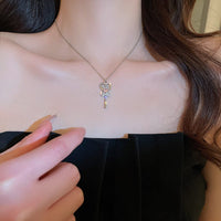 Thumbnail for Chic CZ Inlaid Bowknot Heart Magic Wand Necklace - ArtGalleryZen