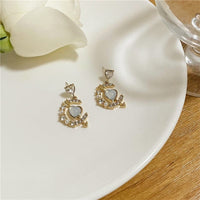 Thumbnail for Chic CZ Inlaid Cupid Arrow Heart Dangle Earrings - ArtGalleryZen