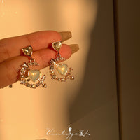 Thumbnail for Chic CZ Inlaid Cupid Arrow Heart Dangle Earrings - ArtGalleryZen