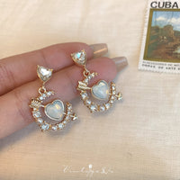 Thumbnail for Chic CZ Inlaid Cupid Arrow Heart Dangle Earrings - ArtGalleryZen