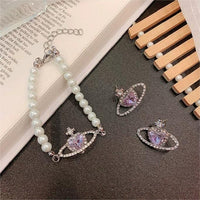 Thumbnail for Chic CZ Inlaid Purple Saturn Necklace Earrings Bracelet Set - ArtGalleryZen