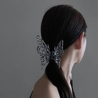 Thumbnail for Chic Hollow Butterfly Chignon Claw Clip Hair Clip - ArtGalleryZen