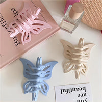 Thumbnail for Chic Hollowed-out Butterfly Chignon Claw Clip Hair Clip - ArtGalleryZen