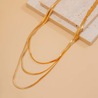 Thumbnail for Chic Layered Cross Herringbone Chain Necklace - ArtGalleryZen