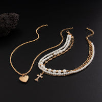 Thumbnail for Chic Layered Crystal Inlaid Cross Heart Pendant Pearl Chain Necklace Set - ArtGalleryZen