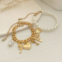 Thumbnail for Chic Layered Heart Bow Rose Charm Pearl Chain Bracelet Set - ArtGalleryZen