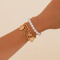 Thumbnail for Chic Layered Heart Bow Rose Charm Pearl Chain Bracelet Set - ArtGalleryZen
