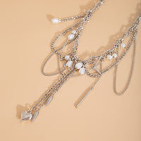 Thumbnail for Chic Layered Pearl Rivet Tassel Heart Pendant Cable Chain Y Necklace - ArtGalleryZen