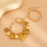 Thumbnail for Chic Layered Textured Heart Tassel Ball Chain Bracelet Set - ArtGalleryZen