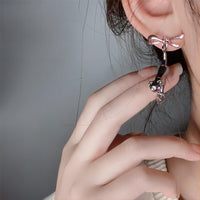Thumbnail for Chic Pink Crystal Heart Dangling Ribbon Cat Earrings - ArtGalleryZen