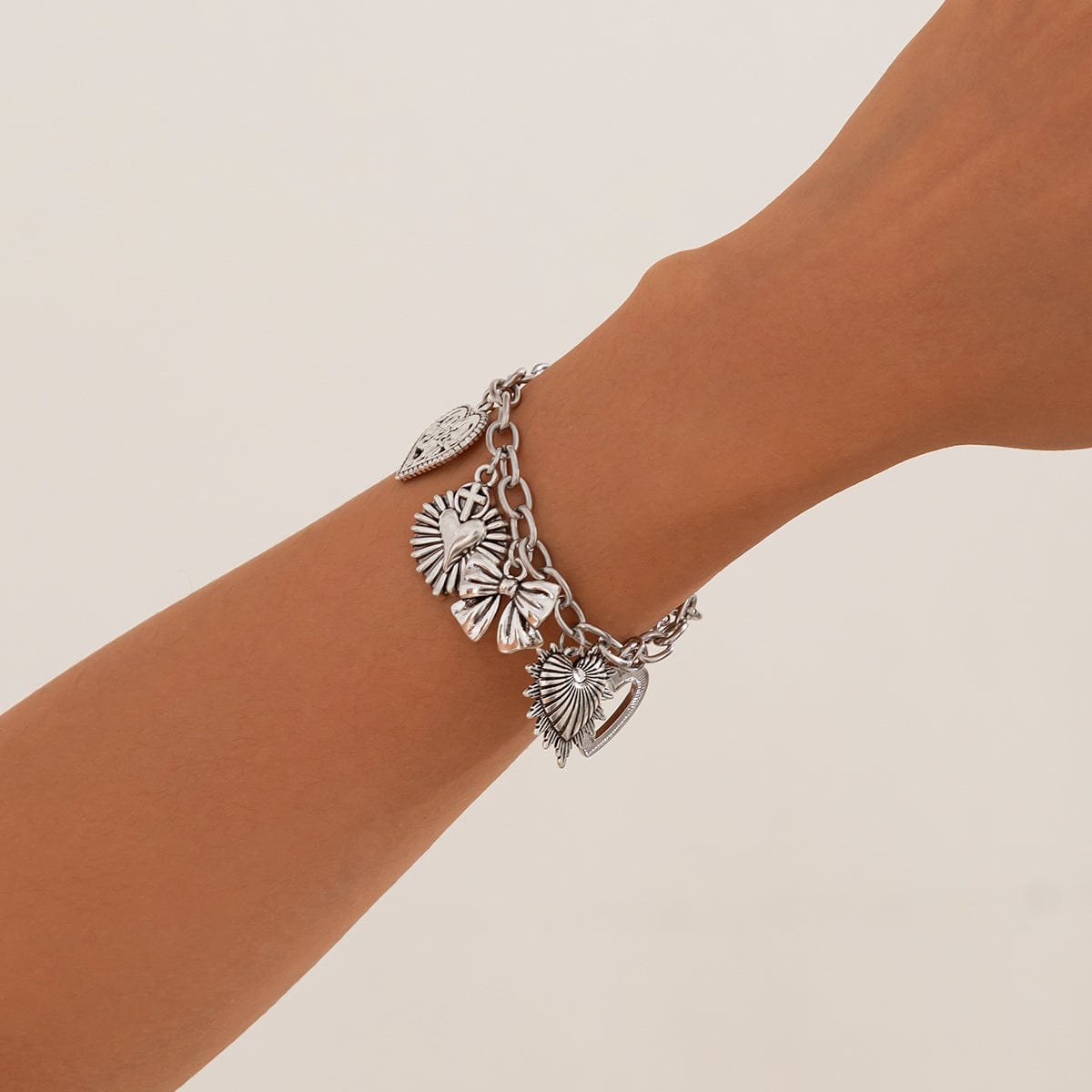 Chic Silver Tone Pattern Heart Bowknot Pendant Bracelet - ArtGalleryZen