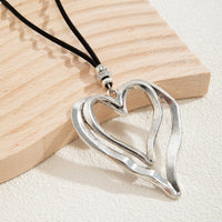 Thumbnail for Chic Velvet Double Hollow Heart Pendant Necklace - ArtGalleryZen