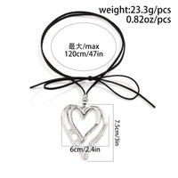 Thumbnail for Chic Velvet Double Hollow Heart Pendant Necklace - ArtGalleryZen