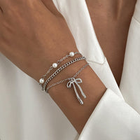 Thumbnail for Dainty Layered Bowknot Pendant Pearl Curb Chain Bracelet - ArtGalleryZen
