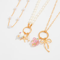 Thumbnail for Elegant 3pcs Bow Starfish Flower Ceramic Pendant Pearl Chain Necklace Set - ArtGalleryZen