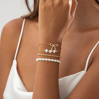 Thumbnail for Elegant 4pcs Bowknot Charm Pearl Rope Chain Bracelet Set - ArtGalleryZen