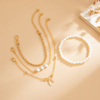 Thumbnail for Elegant 4pcs Bowknot Charm Pearl Rope Chain Bracelet Set - ArtGalleryZen