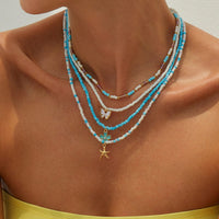 Thumbnail for Elegant 4pcs Enamel Butterfly Flower Starfish Pendant Seed Beaded Necklace Set - ArtGalleryZen