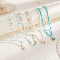 Thumbnail for Elegant 4pcs Enamel Butterfly Flower Starfish Pendant Seed Beaded Necklace Set - ArtGalleryZen
