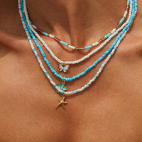 Thumbnail for Elegant 4pcs Enamel Butterfly Flower Starfish Pendant Seed Beaded Necklace Set - ArtGalleryZen