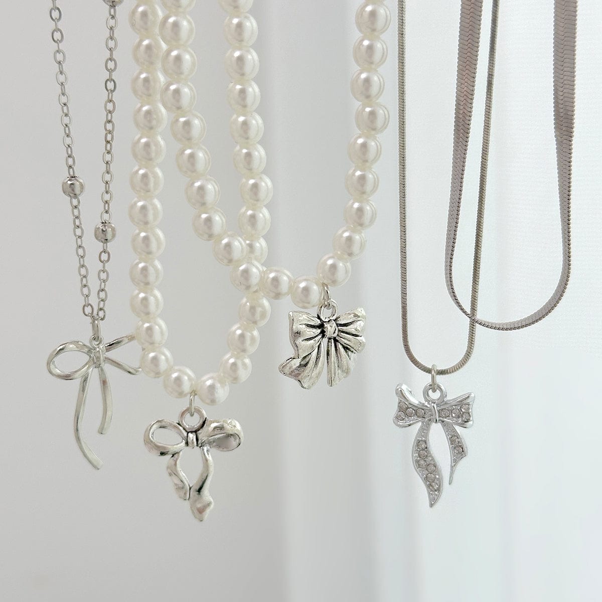 Elegant 5pcs Bowknot Pendant Pearl Herringbone Chain Necklace Set - ArtGalleryZen