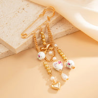 Thumbnail for Elegant Floral Ceramic Beads Bow Heart Tassel Pin Brooch - ArtGalleryZen