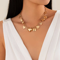 Thumbnail for Elegant Gold Silver Tone Relief Heart Bowknot Tassel Necklace - ArtGalleryZen