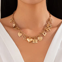 Thumbnail for Elegant Gold Silver Tone Relief Heart Bowknot Tassel Necklace - ArtGalleryZen