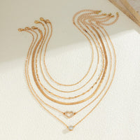 Thumbnail for Elegant Layered CZ Inlaid Heart Pendant Snake Chain Necklace Set - ArtGalleryZen