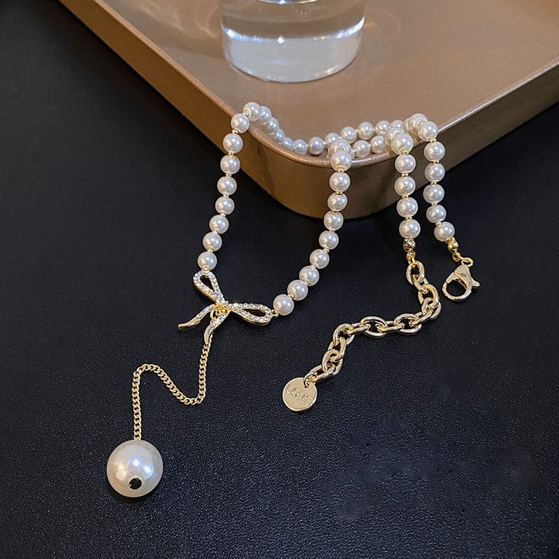 Elegant Rhinestone Inliad Bowknot Charm Pearl Chain Y Necklace - ArtGalleryZen
