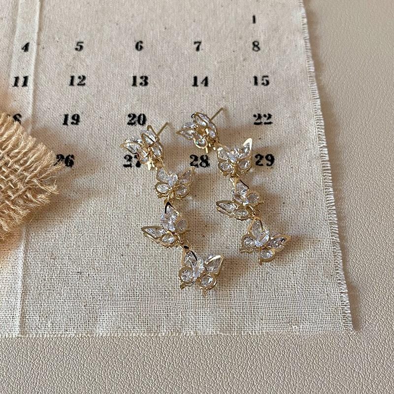 French Style CZ Inlaid Butterfly Tassel Earrings - ArtGalleryZen