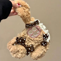 Thumbnail for A plush bunny phone case with a polka dot bowknot and a soft brown color palette.