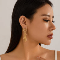 Thumbnail for Geometric Dangling Spiral Oval Stud Earrings - ArtGalleryZen