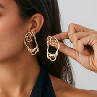 Thumbnail for Geometric Irregular Hollow Pattern Stud Earrings - ArtGalleryZen