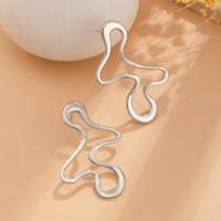 Thumbnail for Minimalist Irregular Hollow Pattern Stud Earrings - ArtGalleryZen