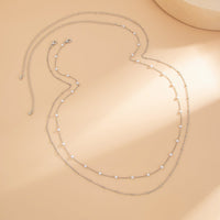 Thumbnail for Minimalist Layered Pearl Saturn Waist Chain Set - ArtGalleryZen