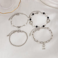 Thumbnail for Stylish Layered Bear Bowknot Charm Pearl Rope Chain Bracelet Set - ArtGalleryZen