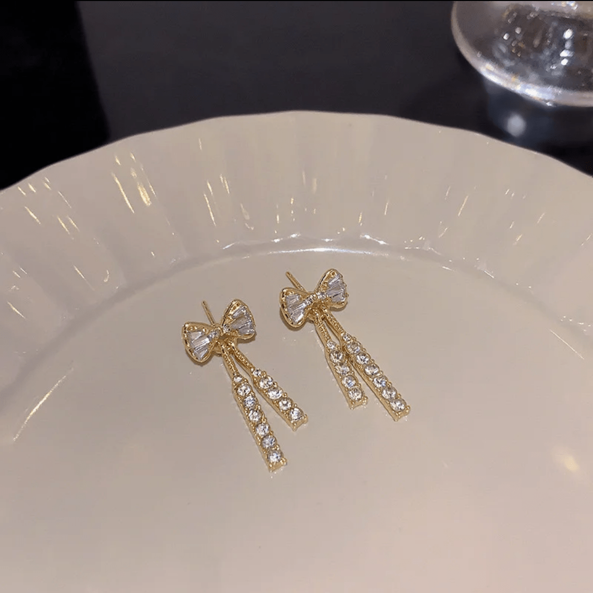 Trendy CZ Inlaid Bowknot Tassel Earrings - ArtGalleryZen