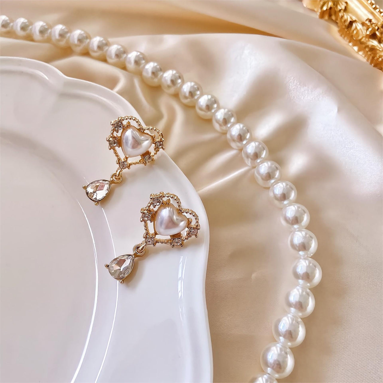 Trendy Dangling Rhinestone CZ Inlaid Pearl Heart Earrings - ArtGalleryZen