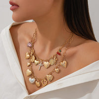 Thumbnail for Trendy Layered Rhinestone Pearl Inlaid Heart Cross Pendant Necklace Set - ArtGalleryZen